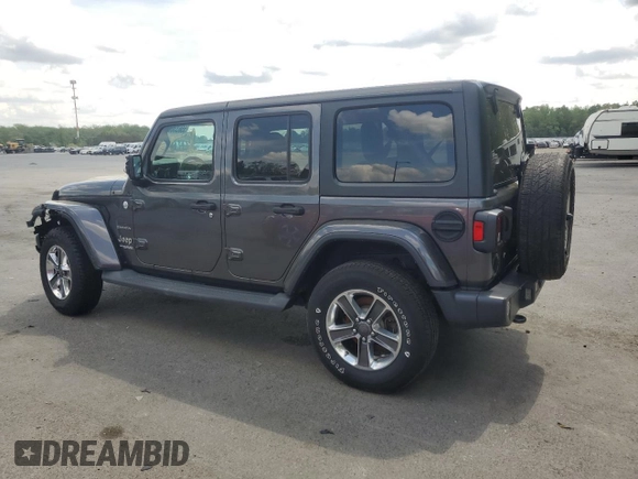 2019 Jeep Wrangler Unlimited Sahara with VIN 1C4HJXEN1KW504490, listed as a Copart auction lot 55633055 with 81,444 mi miles and Salvage Title. Bid and sale history available at DreamBid. Image 2.