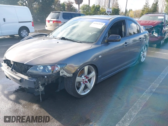 2007 Mazda 3 S Touring with VIN JM1BK324571711878, listed as a IAAI auction lot 41263973 with 158,934 mi miles and . Bid and sale history available at DreamBid. Image 2.