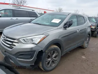 2016 Hyundai Santa Fe z VIN 5XYZTDLB1GG343763, wystawiony jako IAAI lot #41659641 z przebiegiem 96 415 mil mil oraz . Historia ofert i sprzedaży dostępna na DreamBid. Obrazek 17.