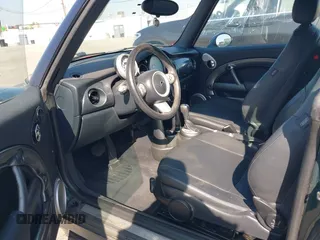 2006 MINI Convertible with VIN WMWRF33566TG15710, listed as a IAAI auction lot 41636955 with Not Provided miles and . Bid and sale history available at DreamBid. Image 5.