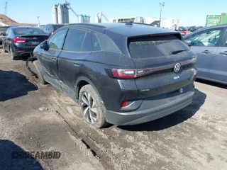 2023 Volkswagen ID.4 Pro with VIN 1V2CMPE8XPC018893, listed as a IAAI auction lot 41694083 with 31,875 mi miles and . Bid and sale history available at DreamBid. Image 3.