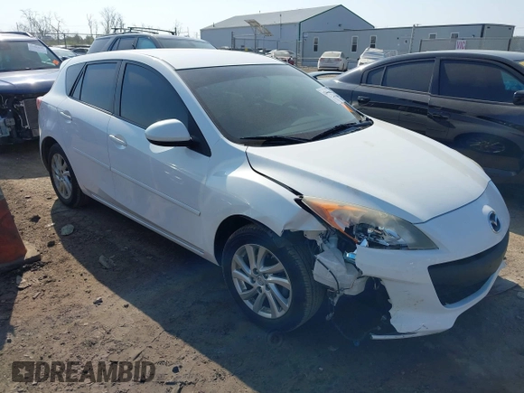 2012 Mazda Mazda3 i Touring with VIN JM1BL1L77C1628618, listed as a IAAI auction lot 42069661 with 201,942 mi miles. Bid and sale history available at carsss.com. Image 1.