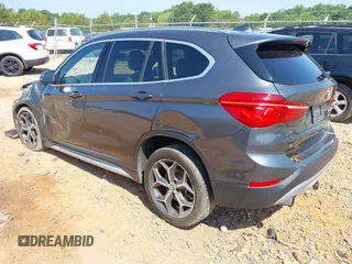 2016 BMW X1 xDrive28i with VIN WBXHT3C31G5E47828, listed as a IAAI auction lot 42592338 with 91,927 mi miles and . Bid and sale history available at DreamBid. Image 3.