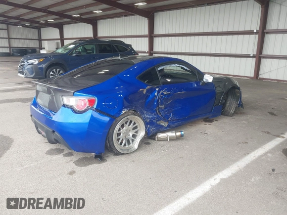2015 Subaru BRZ Limited with VIN JF1ZCAC1XF8603918, listed as a IAAI auction lot 42296875 with 39,869 mi miles and . Bid and sale history available at DreamBid. Image 4.