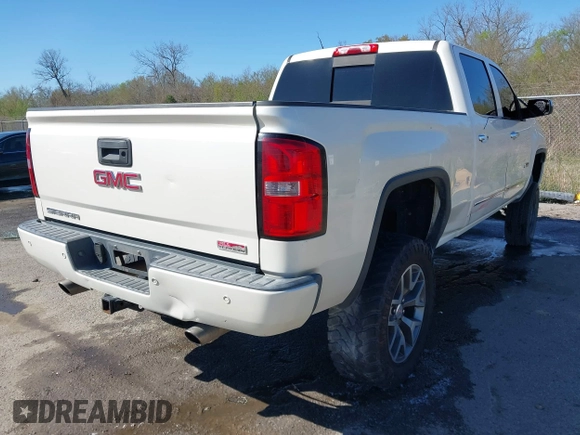 2014 GMC Sierra 1500 SLT with VIN 3GTU2VEC0EG208569, listed as a IAAI auction lot 41834893 with 128,731 mi miles and . Bid and sale history available at DreamBid. Image 4.