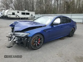 2022 BMW M5 z VIN WBS83CH03NCK43106, wystawiony jako Copart lot #52601885 z przebiegiem Nie podano mil oraz Szkoda całkowita • Salvage title. Historia ofert i sprzedaży dostępna na DreamBid. Obrazek 1.