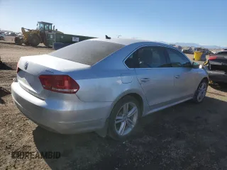 2015 Volkswagen Passat SEL Premium z VIN 1VWCV7A30FC093090, wystawiony jako Copart lot #88577655 z przebiegiem 63 000 mil mil oraz Szkoda całkowita • Salvage title. Historia ofert i sprzedaży dostępna na DreamBid. Obrazek 3.