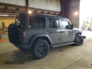 2020 Jeep Wrangler Unlimited Black and Tan with VIN 1C4HJXDG9LW331418, listed as a Copart auction lot 56414765 with 125,339 mi miles and Salvage title. Bid and sale history available at DreamBid. Image 3.