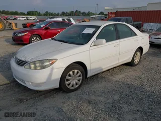 2005 Toyota Camry STD with VIN 4T1BE32K85U401432, listed as a IAAI auction lot 42093301 with 228,557 mi miles. Bid and sale history available at carsss.com. Image 2.