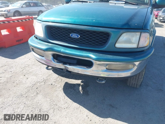 1997 Ford F-150 XL with VIN 1FTDX1861VNA45664, listed as a IAAI auction lot 42005279 with 209,847 mi miles. Bid and sale history available at carsss.com. Image 6.