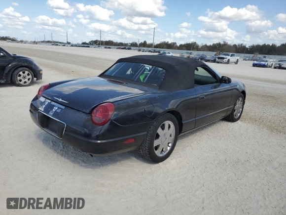 2002 Ford Thunderbird Hardtop Premium with VIN 1FAHP60A12Y120989, listed as a Copart auction lot 77573084 with Not Provided miles and Salvage Title. Bid and sale history available at DreamBid. Image 3.