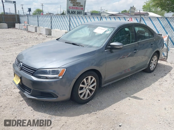 2013 Volkswagen Jetta SE with VIN 3VWDX7AJXDM255977, listed as a IAAI auction lot 42194447 with 120,921 mi miles and . Bid and sale history available at DreamBid. Image 2.