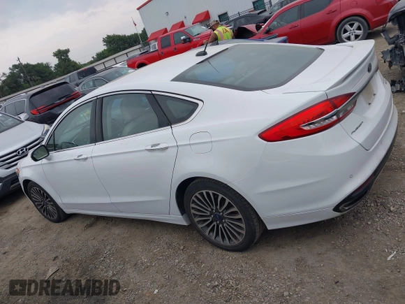 2017 Ford Fusion Titanium z VIN 3FA6P0K96HR124146, wystawiony jako IAAI lot #42428041 z przebiegiem 204 306 mil mil oraz . Historia ofert i sprzedaży dostępna na DreamBid. Obrazek 14.