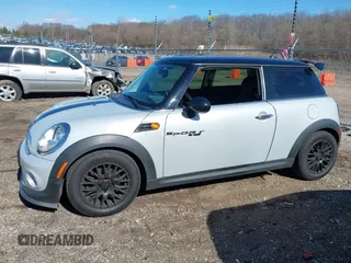 2013 MINI Cooper Hardtop with VIN WMWSU3C56DT683555, listed as a IAAI auction lot 41871323 with 102,527 mi miles. Bid and sale history available at carsss.com. Image 14.