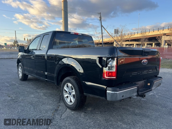 2018 Ford F-150 XL with VIN 1FTEX1CB0JKF17440, listed as a IAAI auction lot 42019621 with 168,007 mi miles. Bid and sale history available at carsss.com. Image 3.