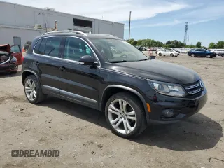 2013 Volkswagen Tiguan SE z VIN WVGAV7AX4DW523112, wystawiony jako Copart lot #53261855 z przebiegiem 86 190 mil mil oraz Szkoda całkowita • Salvage title. Historia ofert i sprzedaży dostępna na DreamBid. Obrazek 4.