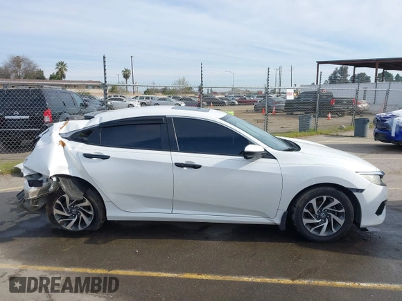 2016 Honda Civic EX with VIN 19XFC2F72GE097060, listed as a IAAI auction lot 41626940 with 156,941 mi miles and . Bid and sale history available at DreamBid. Image 14.