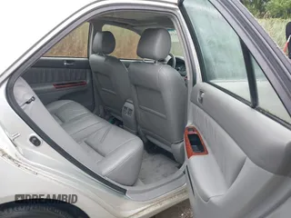 2002 Toyota Camry XLE z VIN JTDBF30K420083381, wystawiony jako IAAI lot #42368073 z przebiegiem 148 746 mil mil oraz . Historia ofert i sprzedaży dostępna na DreamBid. Obrazek 8.
