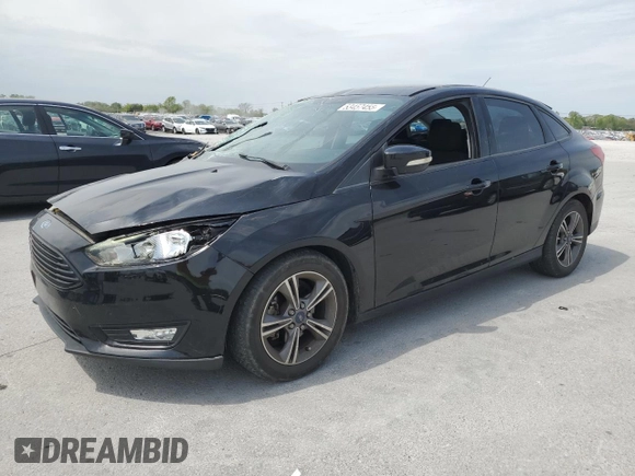 2017 Ford Focus SE with VIN 1FADP3FEXHL281886, listed as a Copart auction lot 53457455 with 84,228 mi miles and Salvage Title. Bid and sale history available at carsss.com. Image 1.