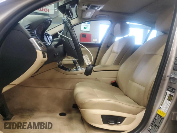 2013 BMW 5 Series 535i xDrive with VIN WBAFU7C57DDU74909, listed as a Copart auction lot 64053715 with 115,521 mi miles and Clean title. Bid and sale history available at DreamBid. Image 7.