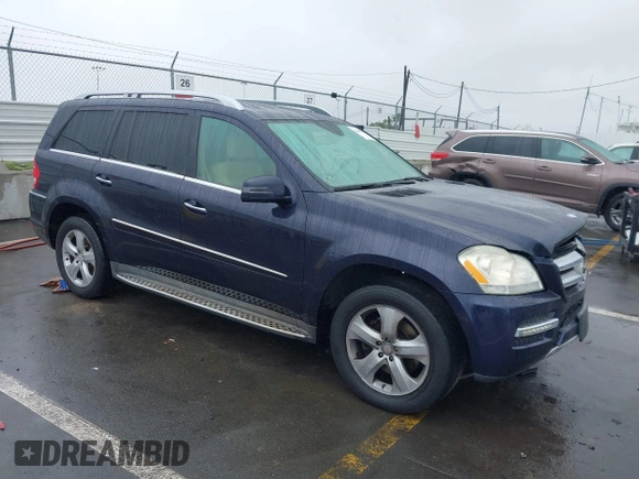 2012 Mercedes-Benz GL 450 z VIN 4JGBF7BE2CA783986, wystawiony jako IAAI lot #41560559 z przebiegiem 157 520 mil mil oraz . Historia ofert i sprzedaży dostępna na DreamBid. Obrazek 1.