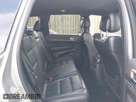 2014 Jeep Grand Cherokee Limited with VIN 1C4RJEBG0EC547674, listed as a IAAI auction lot 42198600 with 122,969 mi miles and . Bid and sale history available at DreamBid. Image 8.