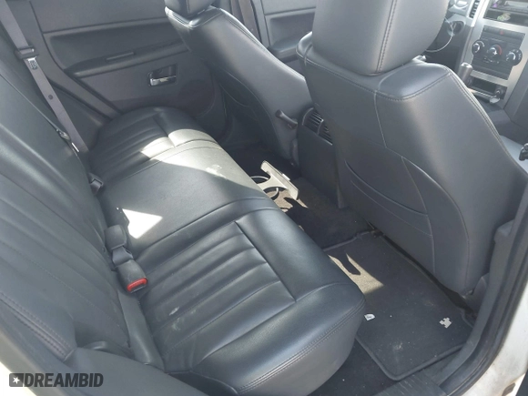 2010 Jeep Grand Cherokee Laredo with VIN 1J4PS4GK6AC112447, listed as a IAAI auction lot 42086245 with 150,875 mi miles. Bid and sale history available at carsss.com. Image 8.