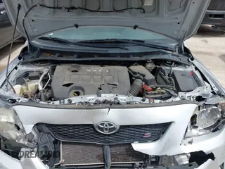 2010 Toyota Corolla with VIN 2T1BU4EE1AC480579, listed as a IAAI auction lot 42210623 with 123,795 mi miles. Bid and sale history available at carsss.com. Image 10.