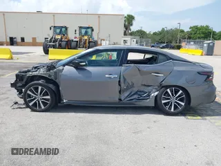 2021 Nissan Maxima SV z VIN 1N4AA6CVXMC508952, wystawiony jako IAAI lot #42491745 z przebiegiem 66 250 mil mil oraz . Historia ofert i sprzedaży dostępna na DreamBid. Obrazek 6.