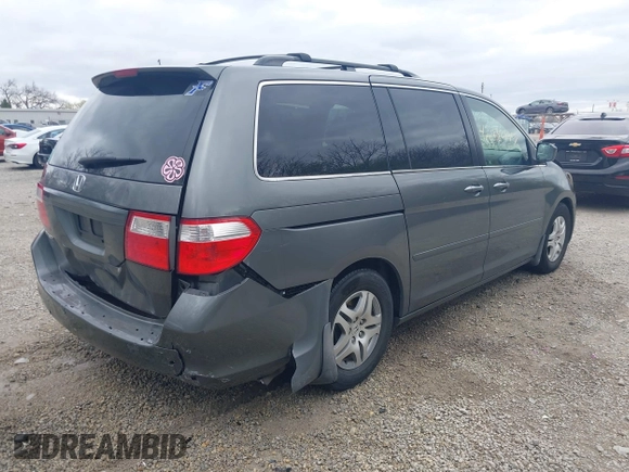 2007 Honda Odyssey EX-L with VIN 5FNRL38767B406636, listed as a IAAI auction lot 42032947 with 228,139 mi miles and . Bid and sale history available at carsss.com. Image 4.