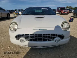 2002 Ford Thunderbird Hardtop Premium z VIN 1FAHP60A92Y103048, wystawiony jako Copart lot #73916924 z przebiegiem 75 396 mil mil oraz Szkoda całkowita • Salvage title. Historia ofert i sprzedaży dostępna na DreamBid. Obrazek 5.