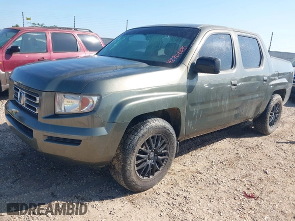 2006 Honda Ridgeline RTL with VIN 2HJYK165X6H512922, listed as a IAAI auction lot 42706885 with 227,241 mi miles and . Bid and sale history available at DreamBid. Image 2.