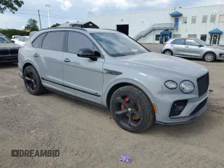 2022 Bentley Bentayga V8 z VIN SJAAM2ZVXNC013736, wystawiony jako Copart lot #67453664 z przebiegiem 22 660 mil mil oraz Nie do naprawy. Historia ofert i sprzedaży dostępna na DreamBid. Obrazek 4.