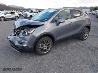2019 Buick Encore Sport Touring with VIN KL4CJ1SB3KB962065, listed as a IAAI auction lot 41206207 with 59,618 mi miles. Bid and sale history available at carsss.com. Image 2.