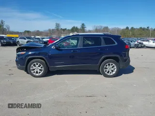 2015 Jeep Cherokee Latitude with VIN 1C4PJMCB3FW652553, listed as a IAAI auction lot 41881238 with 161,944 mi miles and . Bid and sale history available at DreamBid. Image 14.