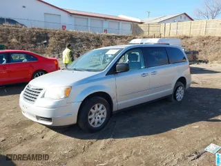 2010 Chrysler Town & Country LX with VIN 2A4RR4DE3AR214489, listed as a IAAI auction lot 41894334 with 255,439 mi miles. Bid and sale history available at carsss.com. Image 2.