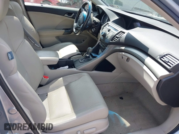2009 Acura TSX with VIN JH4CU26669C022765, listed as a IAAI auction lot 42531096 with 188,506 mi miles and . Bid and sale history available at DreamBid. Image 5.