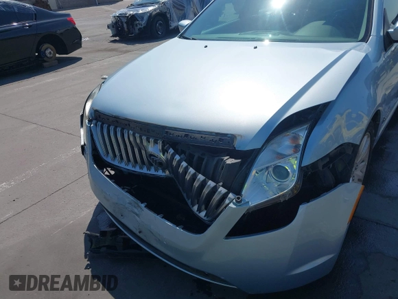 2010 Mercury Milan Hybrid with VIN 3MEDM0L35AR641477, listed as a IAAI auction lot 42443628 with 102,890 mi miles and . Bid and sale history available at DreamBid. Image 6.