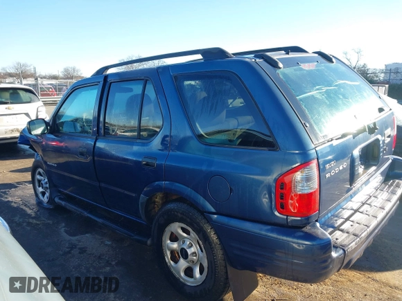 2004 Isuzu Rodeo S with VIN 4S2CK58W444314265, listed as a IAAI auction lot 41294636 with 291,080 mi miles and . Bid and sale history available at DreamBid. Image 14.
