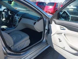 2013 Cadillac CTS Luxury z VIN 1G6DG5E56D0112860, wystawiony jako IAAI lot #41970874 z przebiegiem 125 647 mil mil oraz . Historia ofert i sprzedaży dostępna na DreamBid. Obrazek 5.