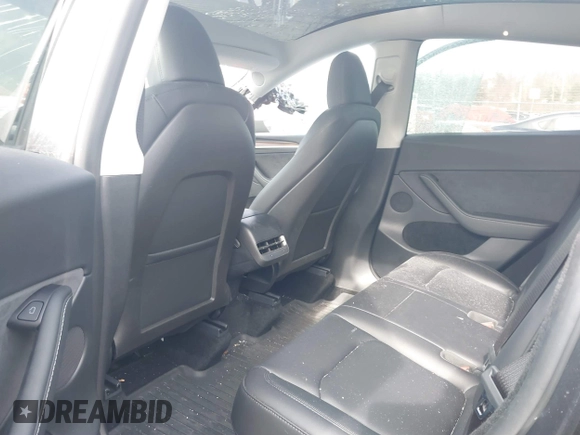 2024 Tesla Model Y Long Range with VIN 7SAYGDEE8RF084936, listed as a IAAI auction lot 41615104 with 14,622 mi miles. Bid and sale history available at carsss.com. Image 8.