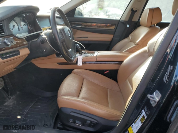 2013 BMW 7 Series 750i xDrive with VIN WBAYB6C50DD223786, listed as a Copart auction lot 87579345 with 143,523 mi miles and Salvage Title. Bid and sale history available at carsss.com. Image 7.