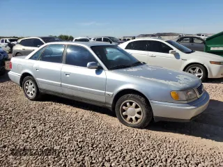 1996 Audi A6 z VIN WAUFA84A9TN007235, wystawiony jako Copart lot #78278774 z przebiegiem 148 857 mil mil oraz Tytuł czysty. Historia ofert i sprzedaży dostępna na DreamBid. Obrazek 4.