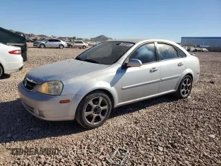 2006 Suzuki Forenza Premium z VIN KL5JJ56Z36K268290, wystawiony jako Copart lot #88509495 z przebiegiem 199 303 mil mil oraz Szkody całkowita. Historia ofert i sprzedaży dostępna na DreamBid. Obrazek 1.
