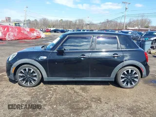 2017 MINI Hardtop 4 Door Cooper S z VIN WMWXU3C39H2F48699, wystawiony jako IAAI lot #41924423 z przebiegiem 81 249 mil mil oraz . Historia ofert i sprzedaży dostępna na DreamBid. Obrazek 14.