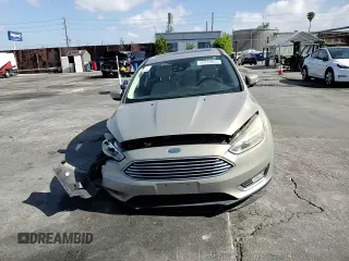 2015 Ford Focus Titanium с VIN 1FADP3J28FL288037, выставлен на аукционе Copart как лот 56972865 с пробегом 75 703 миль миль и Списание • Salvage title. История ставок и продаж доступна на DreamBid. Изображение 14.