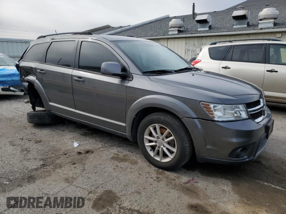 2013 Dodge Journey SXT with VIN 3C4PDCBG5DT695888, listed as a Copart auction lot 50302485 with 126,720 mi miles and Salvage Title. Bid and sale history available at DreamBid. Image 4.