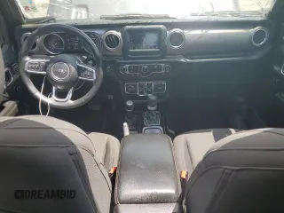 2021 Jeep Wrangler Unlimited Sahara with VIN 1C4HJXENXMW625845, listed as a Copart auction lot 64011475 with 97,505 mi miles and Salvage title. Bid and sale history available at DreamBid. Image 8.