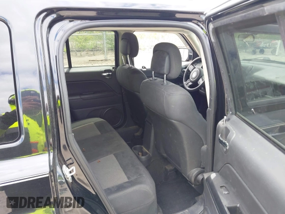 2013 Jeep Patriot Sport with VIN 1C4NJRBB6DD123791, listed as a IAAI auction lot 42202821 with 123,809 mi miles and . Bid and sale history available at DreamBid. Image 8.