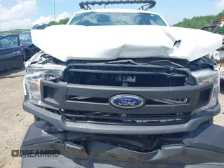 2018 Ford F-150 XL with VIN 1FTEX1CB5JFE55932, listed as a IAAI auction lot 42298917 with 143,923 mi miles and . Bid and sale history available at DreamBid. Image 18.